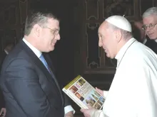 Andrew Walther presents "The Knights of Columbus: An Illustrated History" to Pope Francis. Courtesy photo.