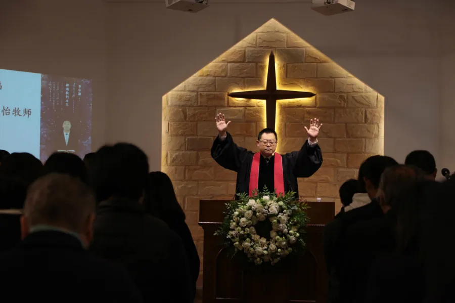 Wang Yi leads a service at Early Rain Covenant Church in Chengdu, China, October 2018. Photo courtesy of Early Rain Covenant Church.?w=200&h=150
