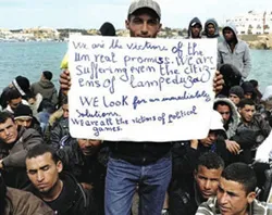 Refugees gathered on the Italian island of Lampedusa. ?w=200&h=150