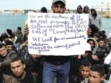 A group of asylum seekers and immigrants at the Italian island of Lampedusa. 
