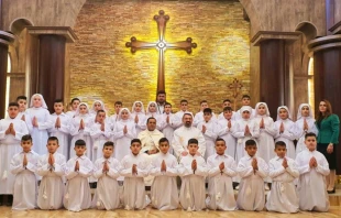 First Communion at at St. George Chaldean Catholic Church in Telskuf, Iraq. Courtesy of Fr. Karam Shamasha.