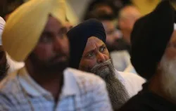 Members of the Miwaukee area Sikh community gather on August 6, 2012 to learn about the shooting spree. ?w=200&h=150