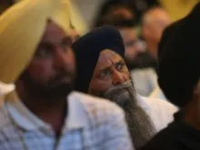 Members of the Miwaukee area Sikh community gather on August 6, 2012 to learn about the shooting spree. 