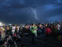 World Youth Day pilgrims during the storm that swept across Cuatro Vientos airfield. 