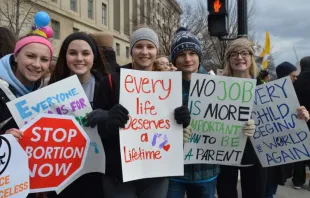 Young people hold signs opposing abortion during the March for Life in Washington, D.C. Addie Mena/CNA.