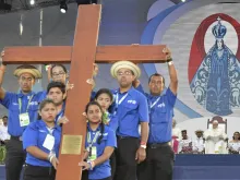 Young people hold the World Youth Day cross in Panama in January 2019. 