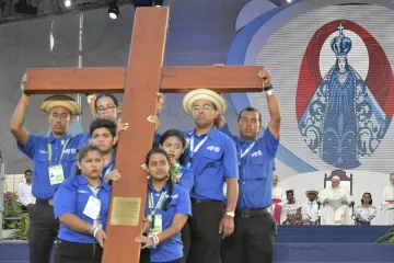 Young people hold the World Youth Day cross in Panama in January 2019 Credit Vatican Media