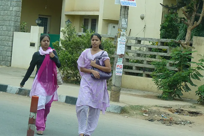 Young professional women walk along the street in Bangalore India Credit Hillary Senour CNA CNA World Catholic News 1 18 13