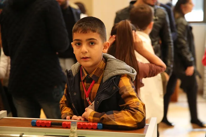 Young refugees play games as they wait for Pope Francis to visit in Istanbul, Turkey on Nov. 30, 2014. ?w=200&h=150
