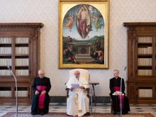Pope Francis gives a general audience address in the library of the Apostolic Palace. 