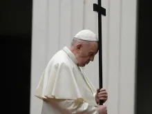 Pope Francis presides at the Stations of the Cross outside St. Peter's Basilica. 