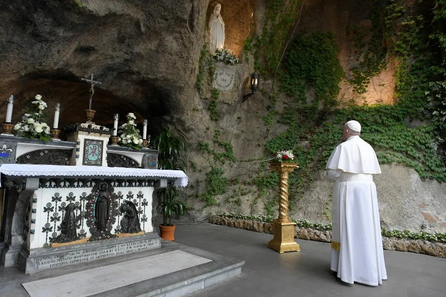 Pope Francis prays at the Lourdes Grotto in the Vatican Gardens May 30, 2020. ?w=200&h=150