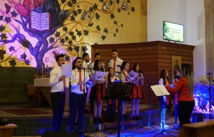 Young Chaldean Catholics refugees from Iraq perform a Christmas choral concert in Beirut, Lebanon.   Hannah Brockhaus/CNA.