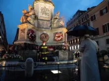 Pope Francis prays before the statue of the Immaculate Conception in Rome’s Piazza di Spagna Dec. 8, 2020.