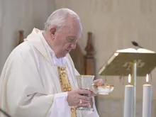 Pope Francis celebrates Mass in the chapel of the Casa Santa Marta July 8, 2020. 