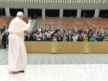 Pope Francis waves to pilgrims at his general audience at the Paul VI Audience Hall Oct. 28. 2020. 