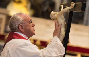 Pope Francis venerating the Cross at the Liturgy of the Lord's Passion on Good Friday in St. Peter's Basilica on April 3, 2015.   Vatican Media.