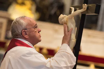  Pope Francis venerating the Cross at the Liturgy of the Lords Passion on Good Friday in St Peters Basilica on April 3 2015 Credit LOsservatore Romano CNA