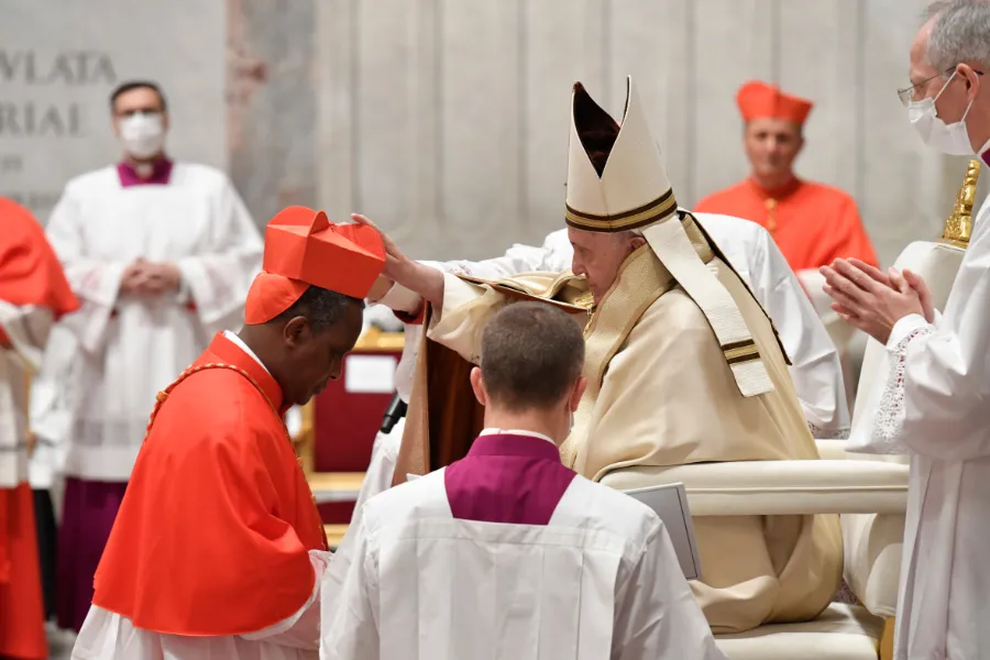 Cardinal Antoine Kambanda receives the red hat from Pope Francis Nov. 28, 2020. ?w=200&h=150