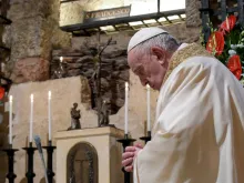 Pope Francis prays at the tomb of St. Francis of Assisi Oct. 3, 2020. 