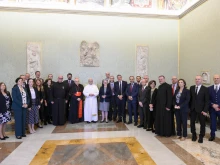 Pope Leo XIV meets with members of Aid to the Church in Need at the Vatican on Oct. 10, 2025.