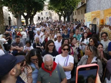 Crowds of people come to pray at Carlo Acutis’ tomb at the church of St. Mary Major in Assisi, Itlay, during the weekend of his Sept. 7, 2025, canonization.