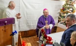 Archbishop Bernard Bober of Košice celebrates Mass with homeless and people in need at the Archdiocesan Charity in Košice, Slovakia, during a traditional Christmas gathering in December 2025.