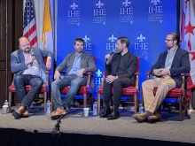 From left: Ross Douthat, media fellow at the Institute for Human Ecology; Will Wilson, CEO of AI company Antithesis; Father Michael Baggot, LC, professor of bioethics at the Pontifical Athenaeum Regina Apostolorum in Rome; and Brian J.A. Boyd, director for the Center for Ethics and Economic Justice at Loyola University New Orleans discuss AI and the Church on Sept. 23, 2025, at The Catholic University of America in Washington, D.C.