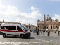 A red cross ambulance passes in front of the Vatican as Italy prepares for the coronavirus, March 9, 2020.