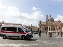A red cross ambulance passes in front of the Vatican as Italy prepares for the coronavirus, March 9, 2020. 