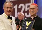 Cardinal Bertone receives the award from Supreme Knight Carl Anderson?w=200&h=150