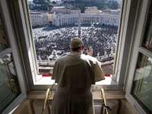 Pope Francis greets the crowd at his Sunday Angelus address on Jan. 29, 2023.