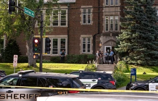 Police gather at Annunciation Catholic School in Minneapolis on Aug. 27, 2025, following a mass shooting that killed two children and injured 17 others, 14 of them children. Credit: Chad Davis, CC BY 4.0, via Wikimedia Commons