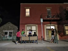 Migrant parents socialize outside the Annunciation House on June 26, 2018, in El Paso, Texas.