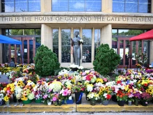 Flowers are seen on Sept. 3, 2025, outside the Annunciation Catholic Church in Minneapolis, where a shooter killed two children and injured 21 other people on Aug. 27, 2025.