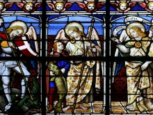 A stained-glass window in St. Sulpice Church in Fougeres, France, depicts (from left to right) the archangels Michael, Raphael, and Gabriel.