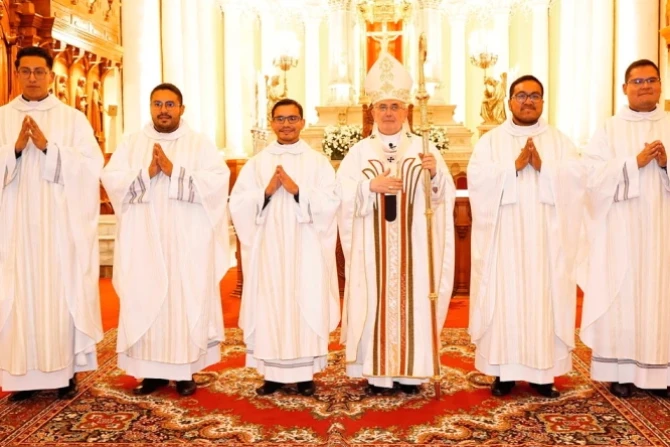 Arequipa Archbishop with newly ordained priests