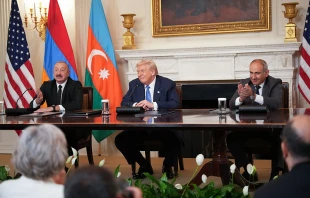 President Donald Trump answers questions during a signing ceremony with Azerbaijani President Ilham Aliyev (left) and Armenian Prime Minister Nikol Pashinyan (right) in the State Dining Room of the White House on Aug. 8, 2025, in Washington, D.C. The agreement signed during the ceremony is intended to bring an end to the conflict between Armenia and Azerbaijani that has lasted for decades. Credit: Andrew Harnik/Getty Images