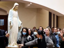 A Marian statue is returned to St. Adday church in Karemlesh, Iraq, March 19, 2021. Photo ourtesy Fr. Thabet Habeb.