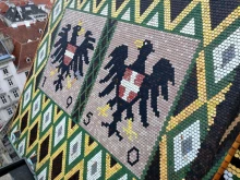 The coat of arms of Austria and Vienna on the Albertine choir roof of St. Stephen’s Cathedral.