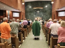 Parishioners attend a July 2024 Mass at St. Peter Church in Quincy, Illinois.