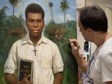 Artist Raúl Berzosa works on the portrait of St. Peter To Rot.