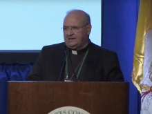 Bishop Peter Baldacchino speaks to bishops about cause for beatification and canonization of Father Richard M. Thomas on Nov. 11, 2025, at the USCCB fall plenary in Baltimore.