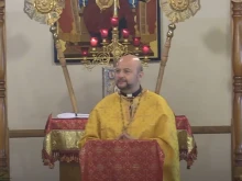 A screenshot of a YouTube video of Bishop-elect Francois Beyrouti giving a homily on July 31, 2022.