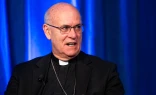 Bishop Kevin C. Rhoades of the Diocese of Fort Wayne-South Bend, Indiana, the chair of the United States Conference of Catholic Bishops’ religious liberty committee, speaks on the issue of immigration during a press conference on Nov. 11, 2025, at the USCCB’s fall plenary assembly in Baltimore.