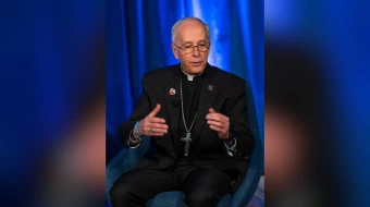 Bishop Mark Seitz, chairman of the United States Conference of Catholic Bishops’ migration committee, speaks during a press conference on Nov. 11, 2025, at the USCCB’s fall plenary assembly in Baltimore.