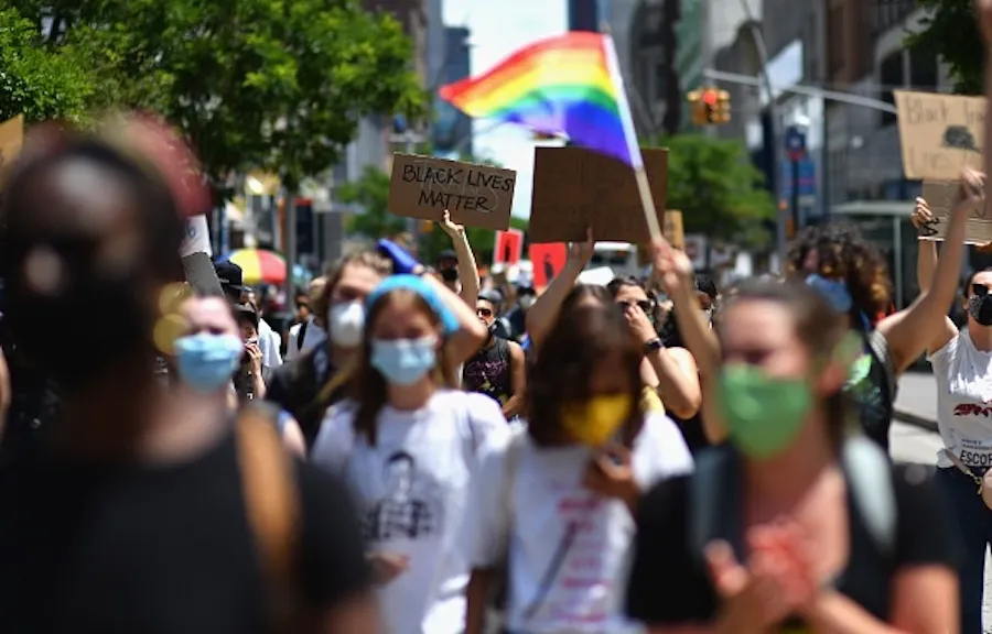  Protesters march during a "Black Trans Lives Matter" march against police brutality on June 17, 2020 in the Brooklyn Borough of New York City. ?w=200&h=150