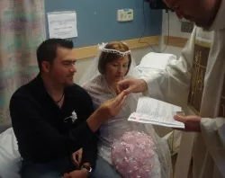 Ricardo and Mayra Sadoval at their wedding in the hospital?w=200&h=150