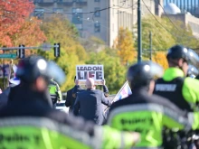 Police protect marchers at the fourth annual National Men’s March to Abolish Abortion and Rally for Personhood in Boston on Nov. 1, 2025.