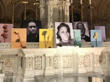 Photos of George Floyd, Breonna Taylor, and Ahmaud Arbery on a side altar at St. Francis Xavier Church in New York City. Courtesy photo.